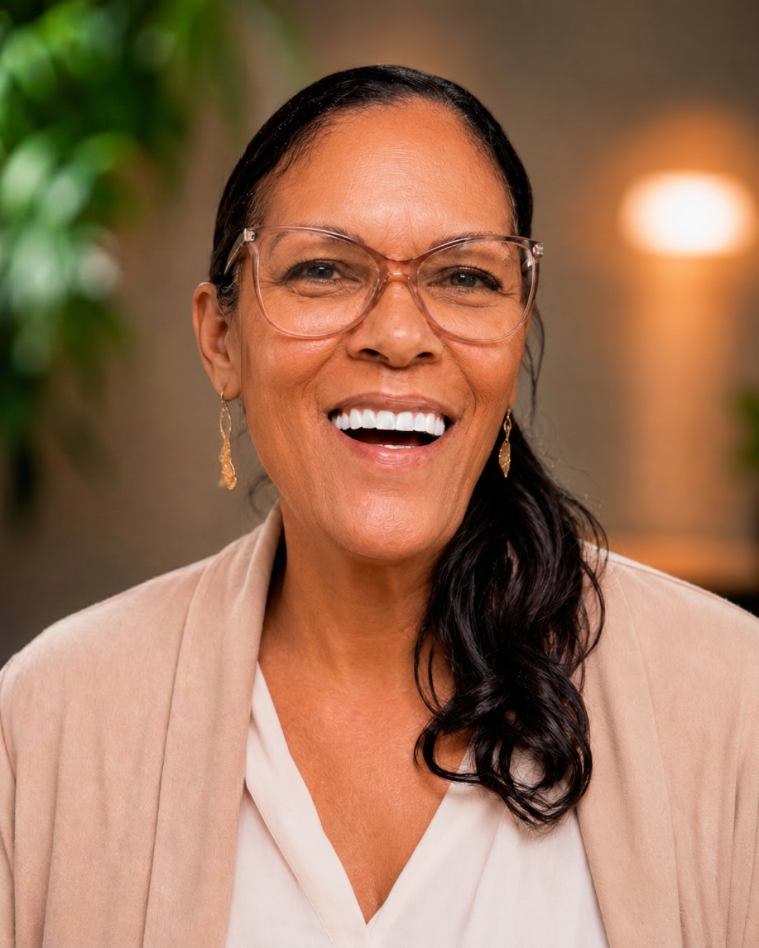 Portrait of Keena René, smiling warmly