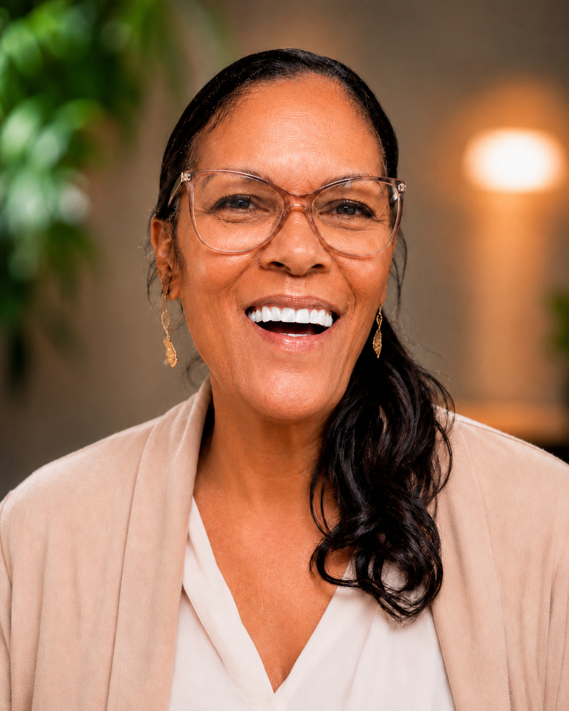 Portrait of Keena René, smiling warmly